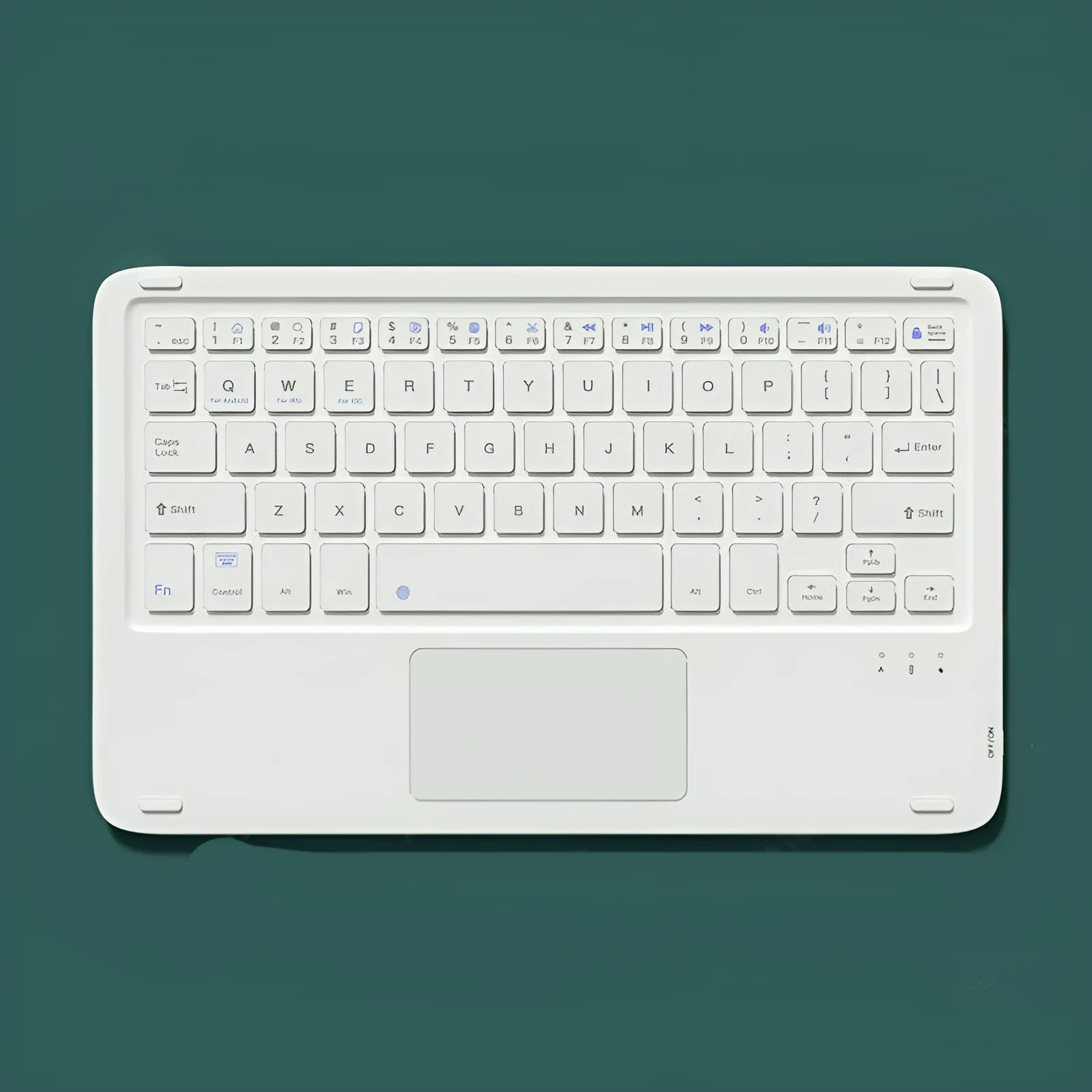 Pink wireless Bluetooth keyboard and mute mouse with USB charging cable on a desk