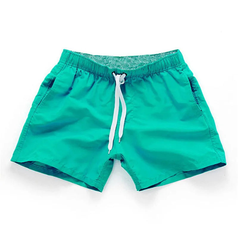 Men's plus size straight-leg beach shorts in multiple colours on a size chart.