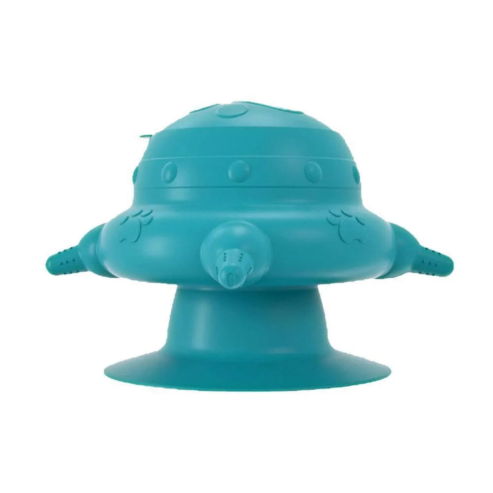 Pink silicone pet nursing device with milk bowl and four pacifiers for puppies and kittens.