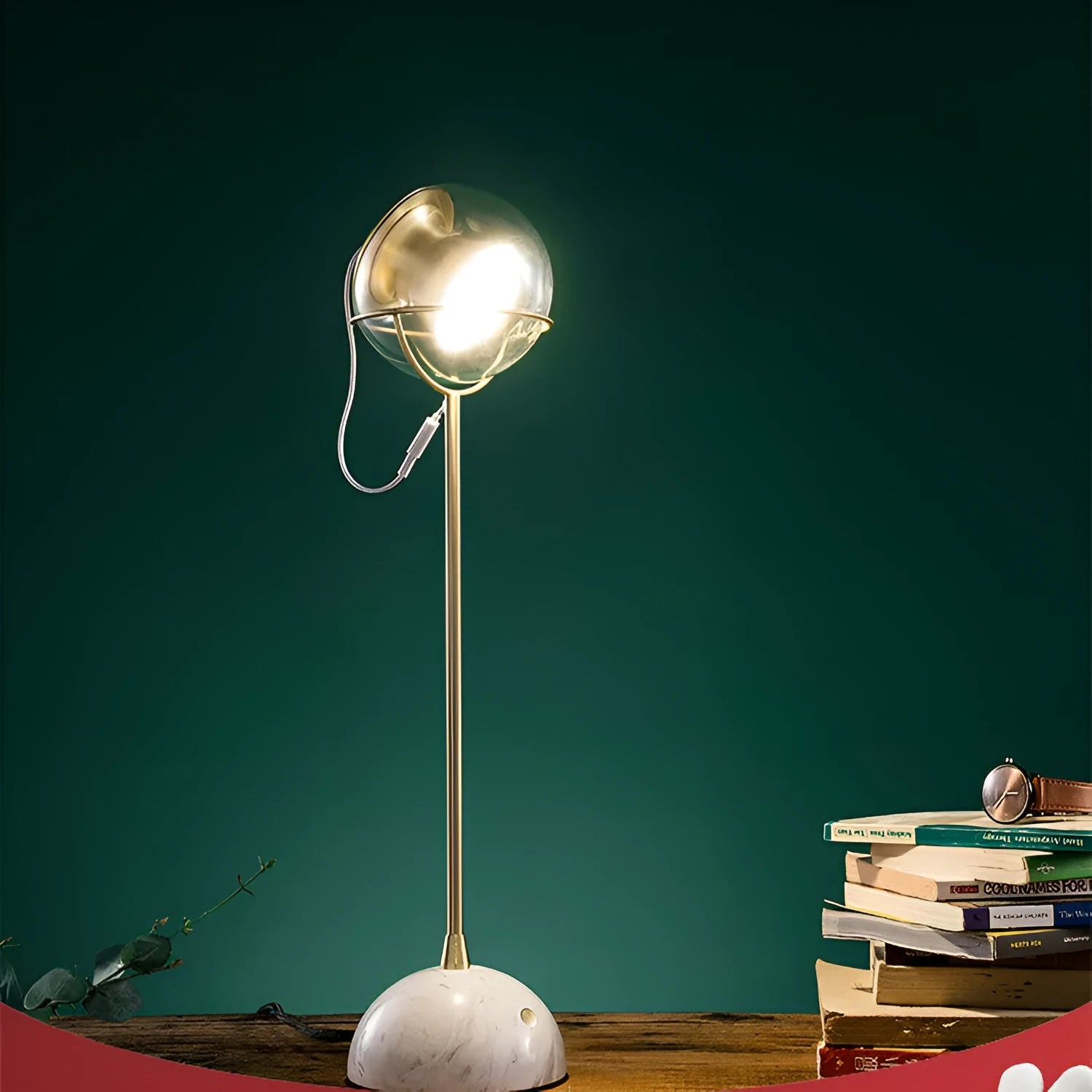 Clear glass desk lamp with dimmable LED light and touch switch on base.