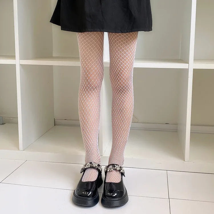 Women's black and white mesh pattern tights showing large, medium, and small net designs for summer.