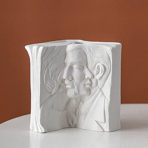 Glazed ceramic book stand ornament in a modern style on a desktop, shown in one of four design options.