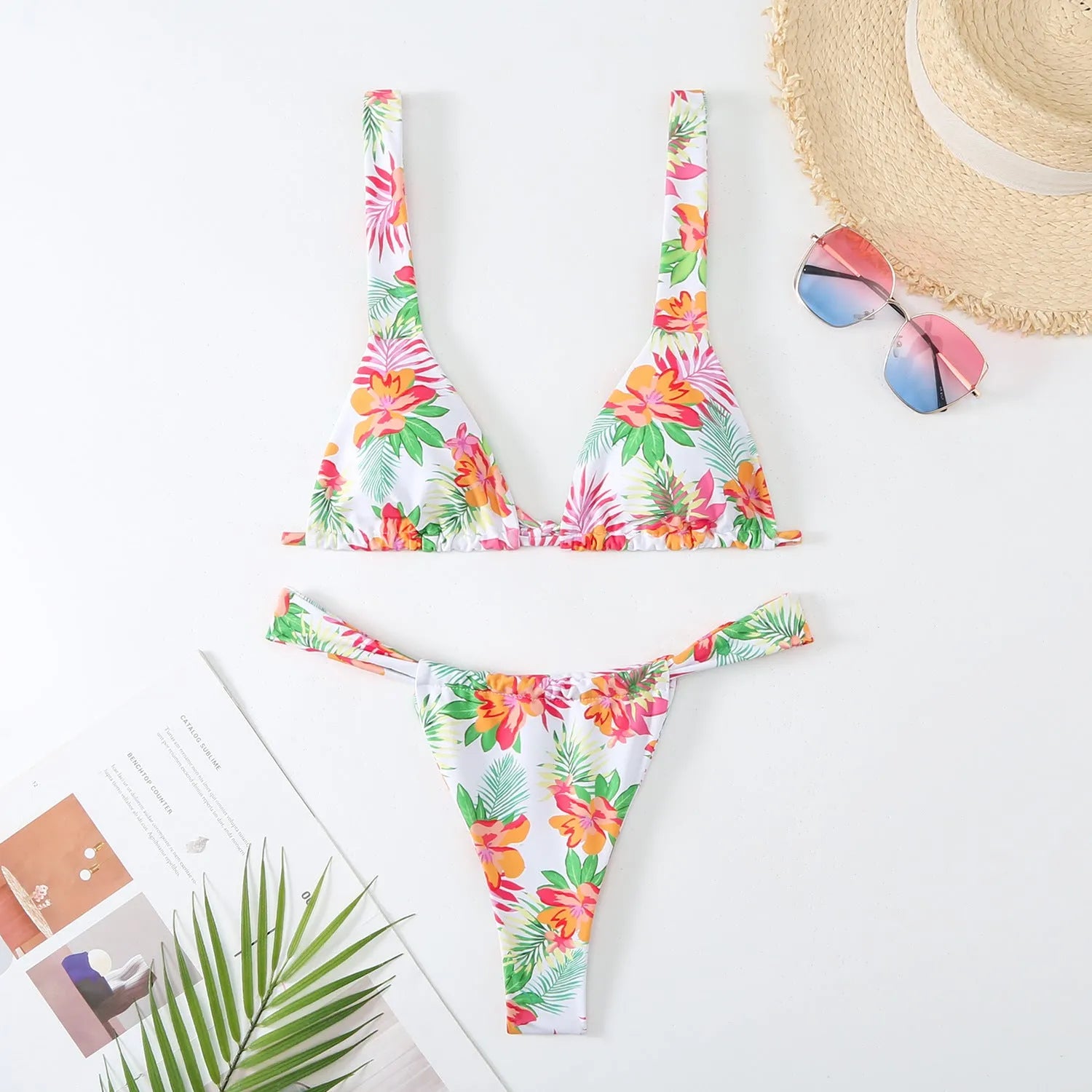 Women's floral print bikini swimsuit in briefs style with multi-colour patterns and polyester fabric construction