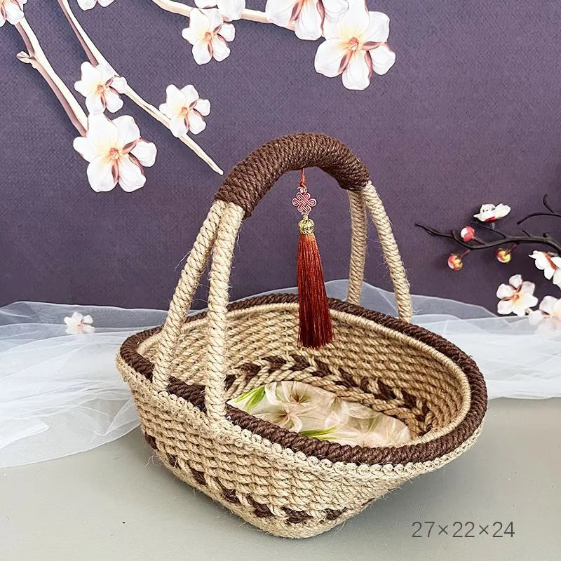 Hand-woven hemp rope basket in rustic coffee brown colour, measuring 19cm by 12cm.
