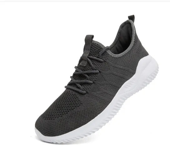 Men's black and white mesh sneakers with round toe and lace-up fastening