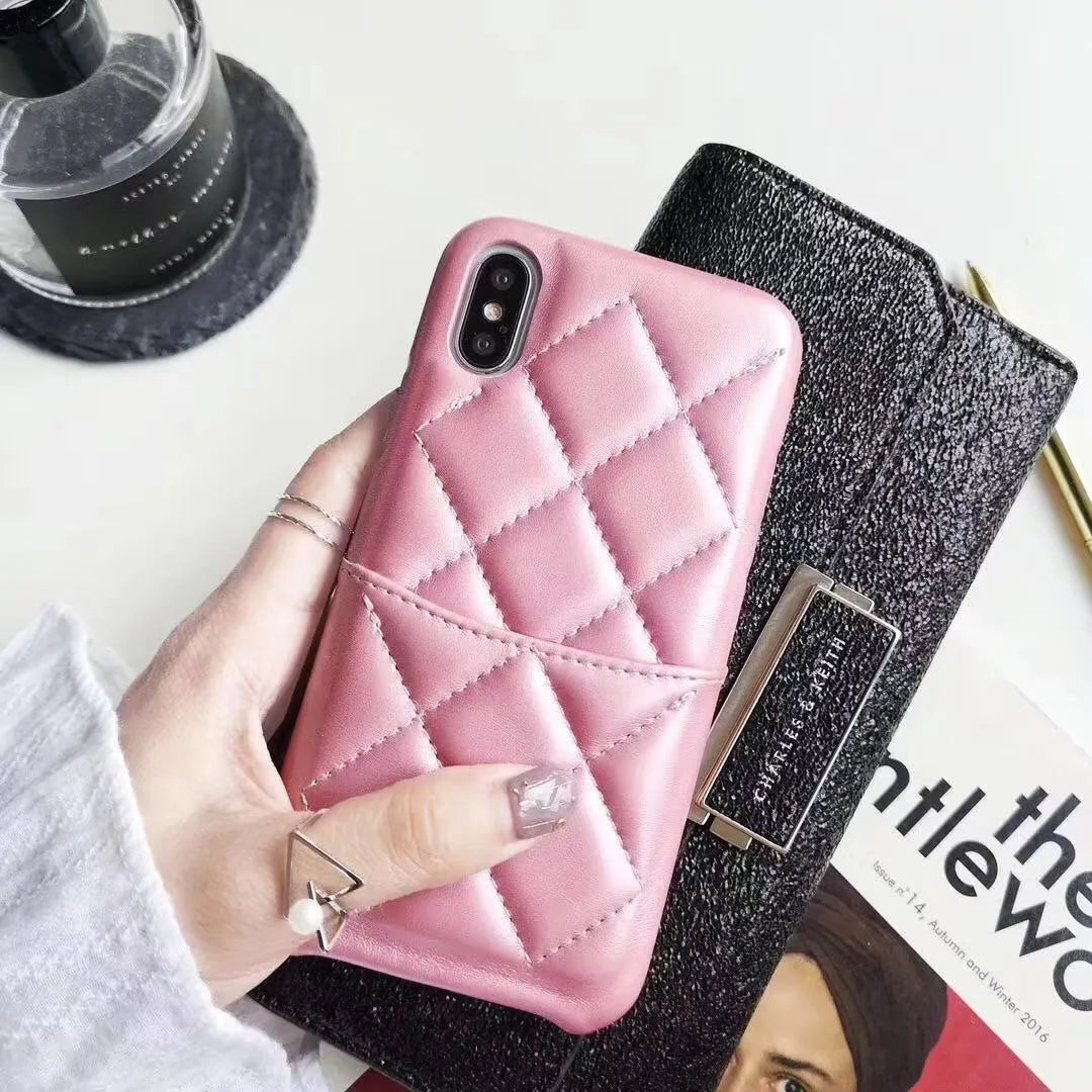 Genuine leather phone case for Apple iPhone in black, pink and red colour options.