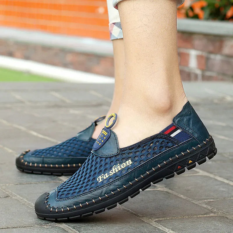 Men's solid-colour casual mesh shoes with a round toe and non-slip rubber sole.