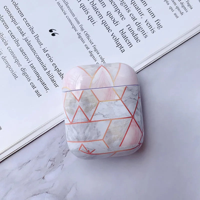 White Marble hard PC protective case fitted on an AirPods wireless charging case.