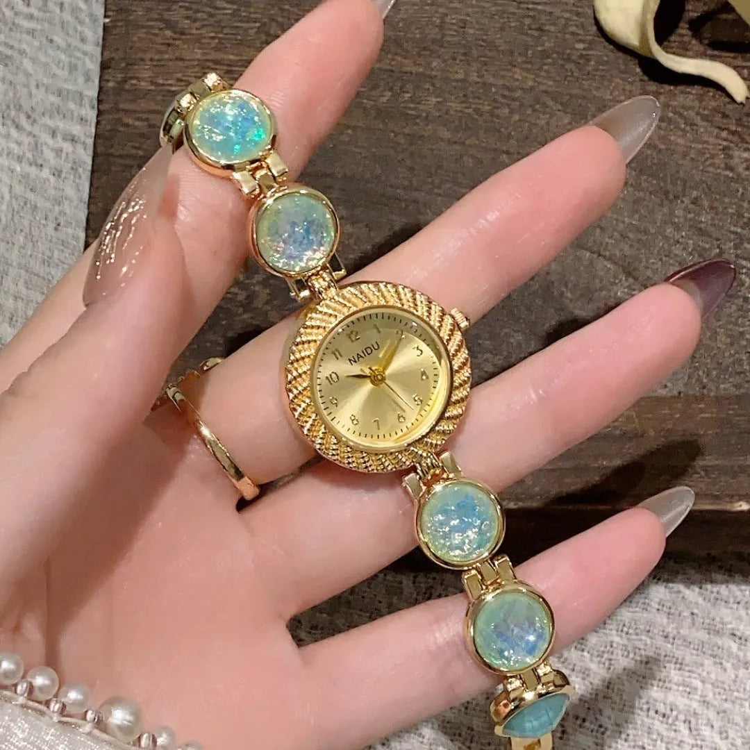 Women's quartz watch with 25mm round dial in choice of six colours on wrist.