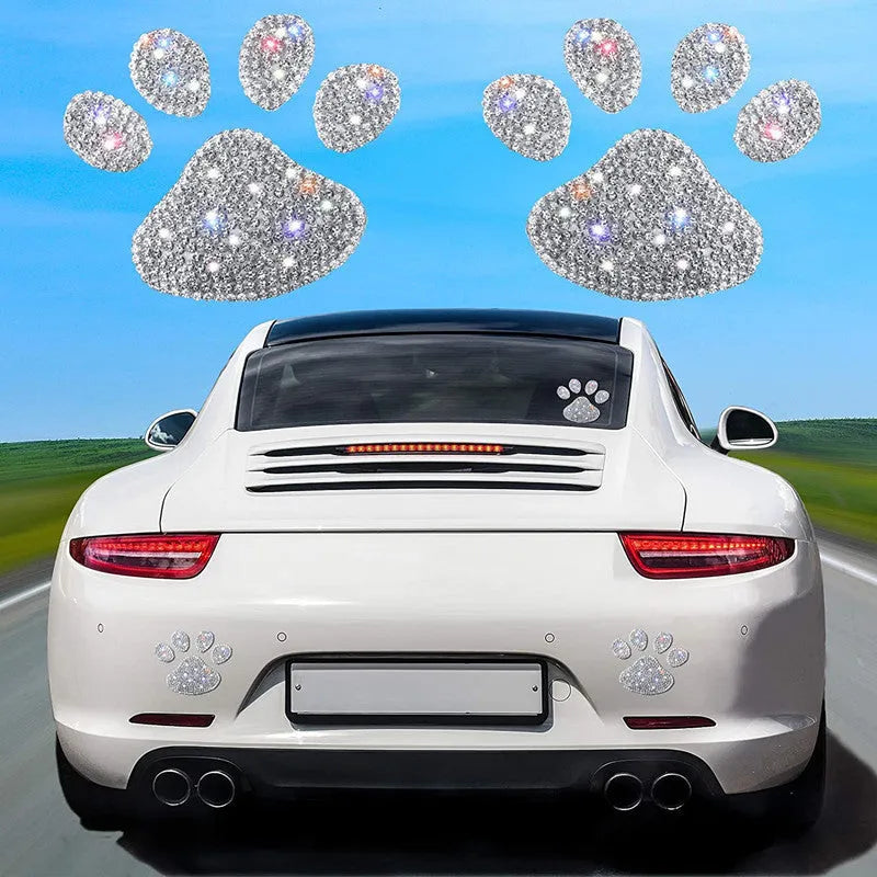 Close-up of a diamond-encrusted butterfly and bear claw design on a 7x6cm glass car sticker