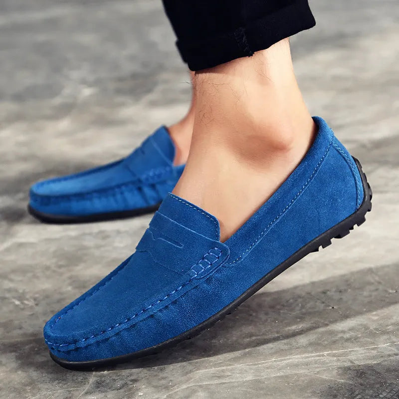 Men's brown suede leather casual shoes with round toe and flat rubber sole on a white background