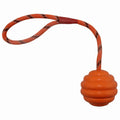 Multi-colour rubber pet toy ball with rope knot design for bite-resistant chewing and dental cleaning