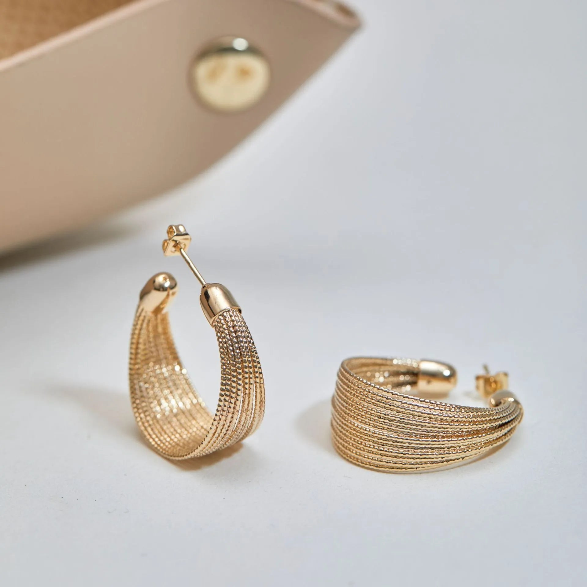 Geometric multi-layer bracelet earrings set with silver and gold colour pairs on copper
