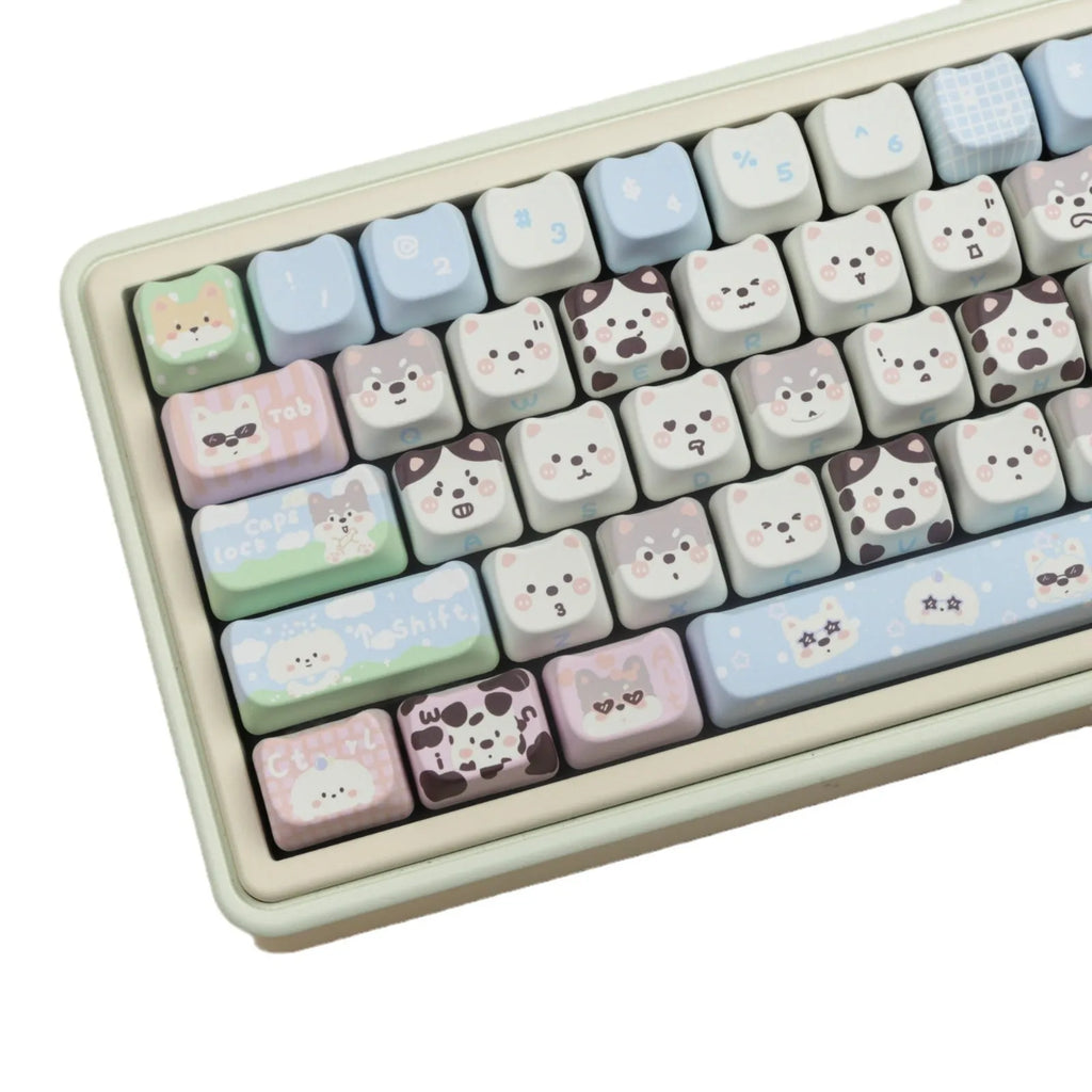 Colourful cat and puppy themed PBT key cap set for mechanical keyboards with cartoon animal artwork