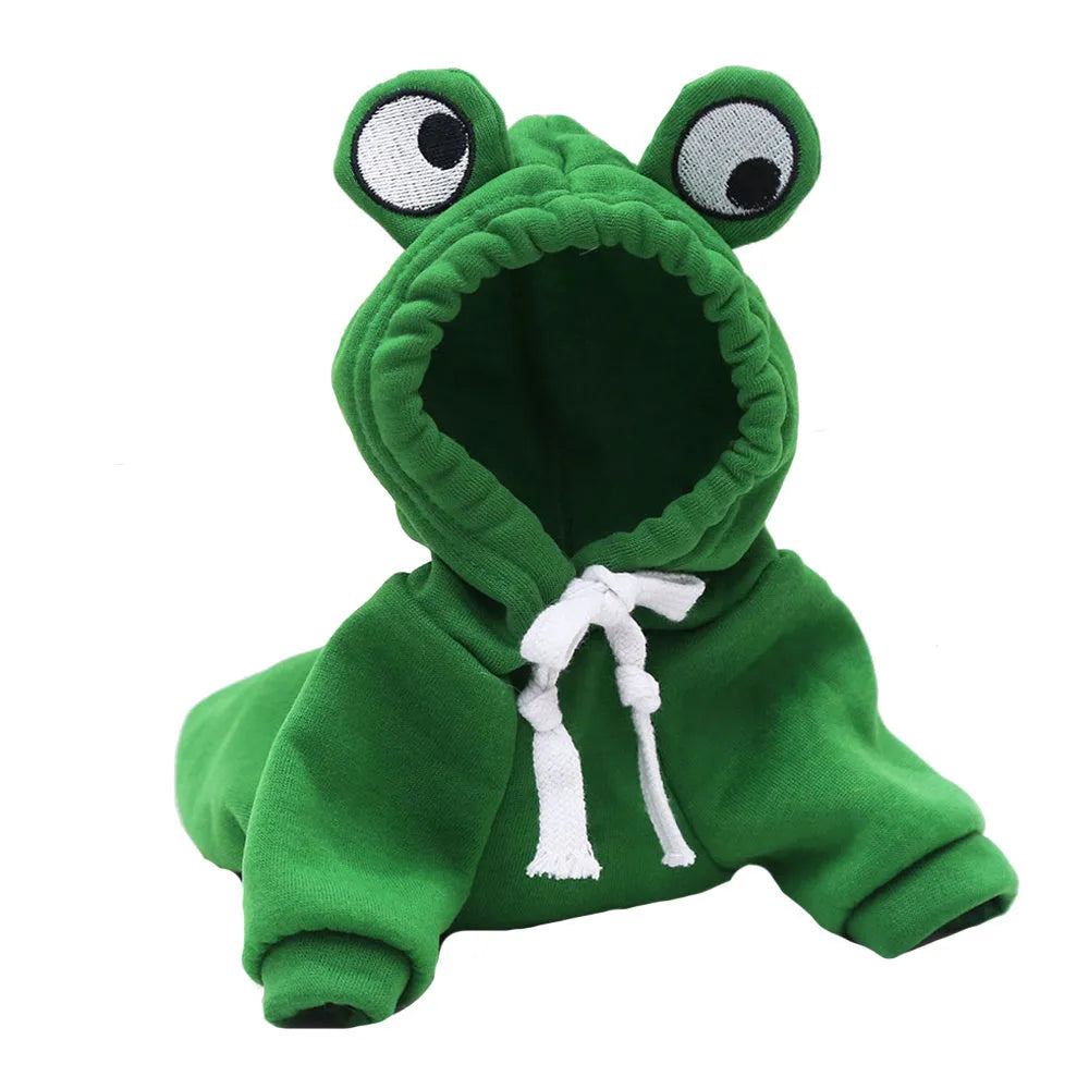 Green frog costume hoodie on a small dog, showing soft fabric and hoodie design for Halloween or autumn.