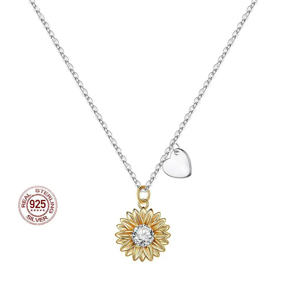 925 sterling silver sunflower necklace with daisy petal detail on an adjustable cross chain