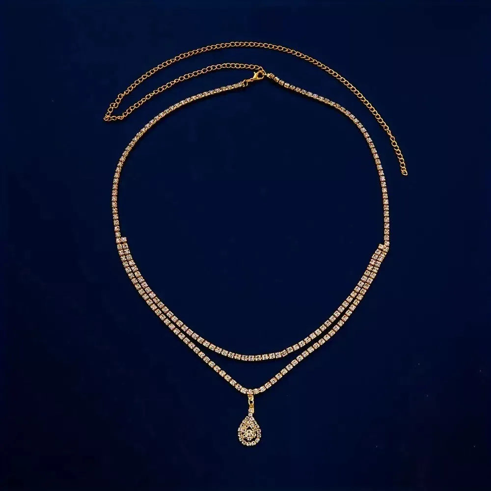 Gold and silver waist chain with water drop pendant and rhinestone decoration for women