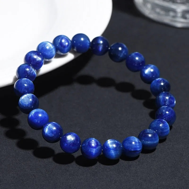 Natural blue crystal ball bracelet with geometric Ruyi design in polished grade 7A crystal