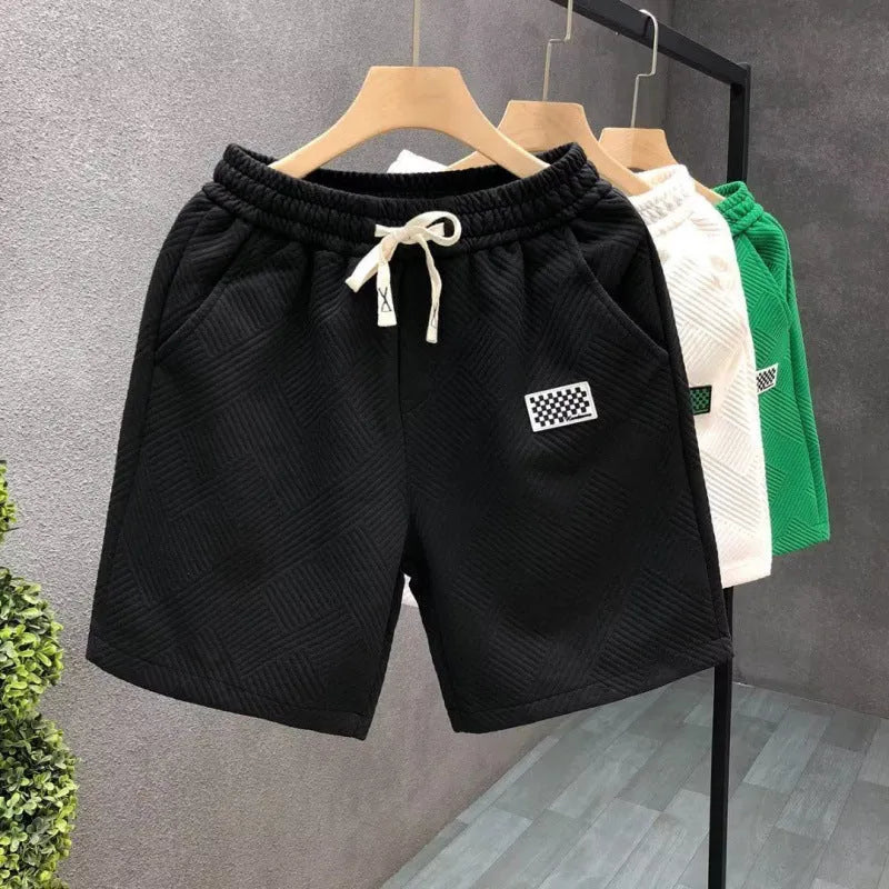 Men's micro-elastic polyester sports shorts in solid colours with American style cut