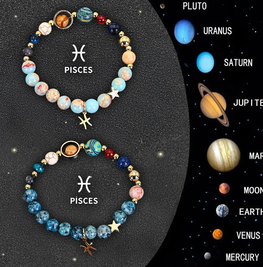 Set of two natural stone beaded bracelets for twelve zodiac signs on a wooden surface.