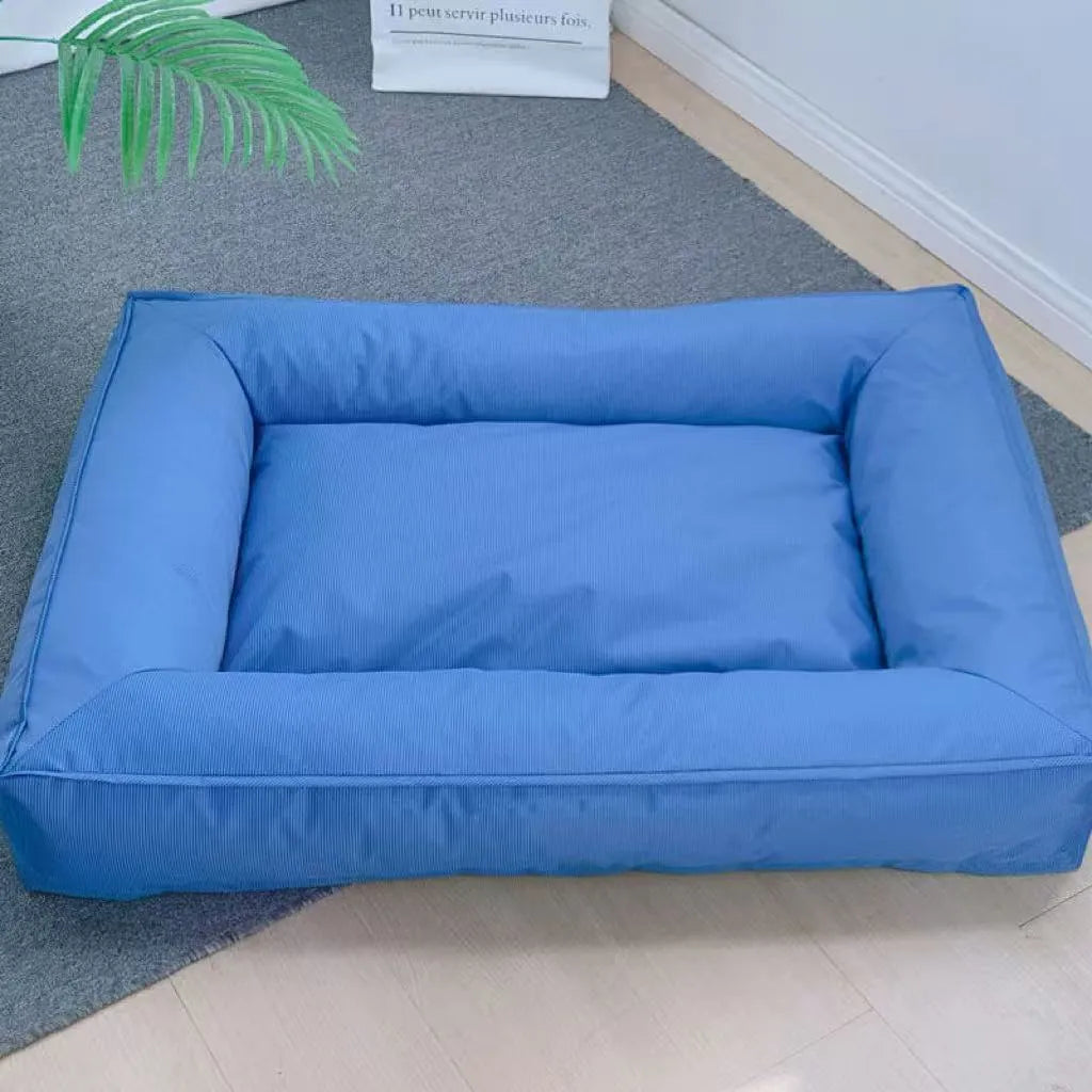 Orthopedic dog bed with full surround support, waterproof Oxford cloth, in blue, available in multiple sizes