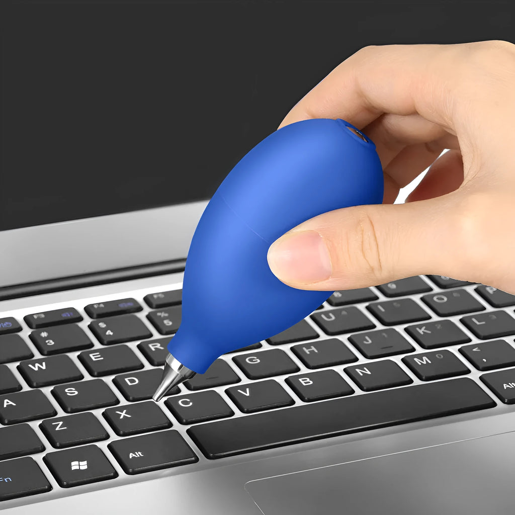 Blue rubber handheld dust removal ball air blower for cleaning cameras and mobile phones.
