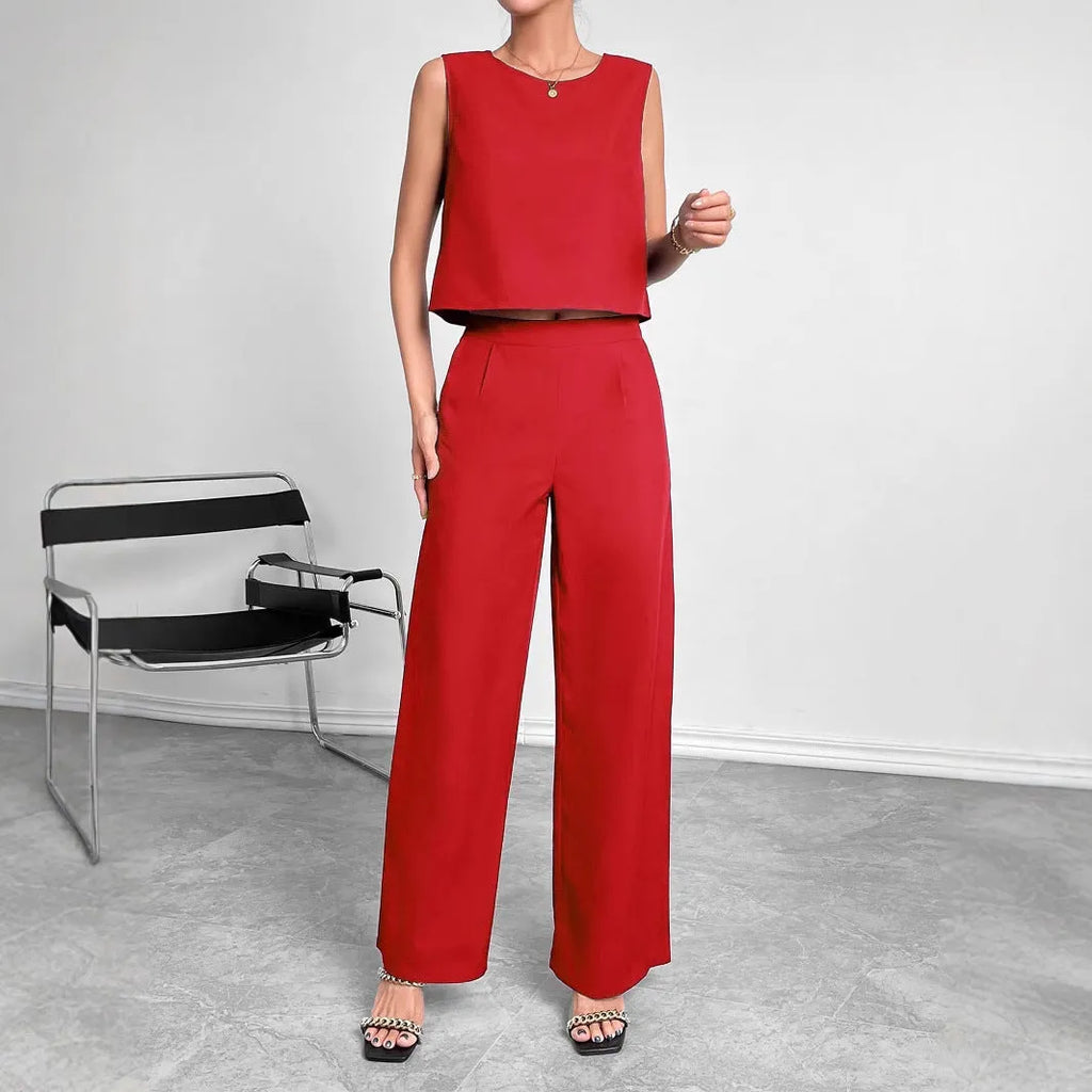 Red polyester two-piece women's set with sleeveless top and wide-leg trousers