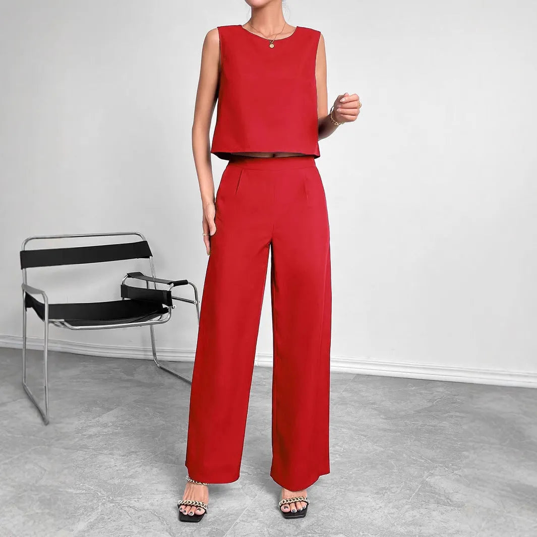 Red polyester two-piece women's set with sleeveless top and wide-leg trousers