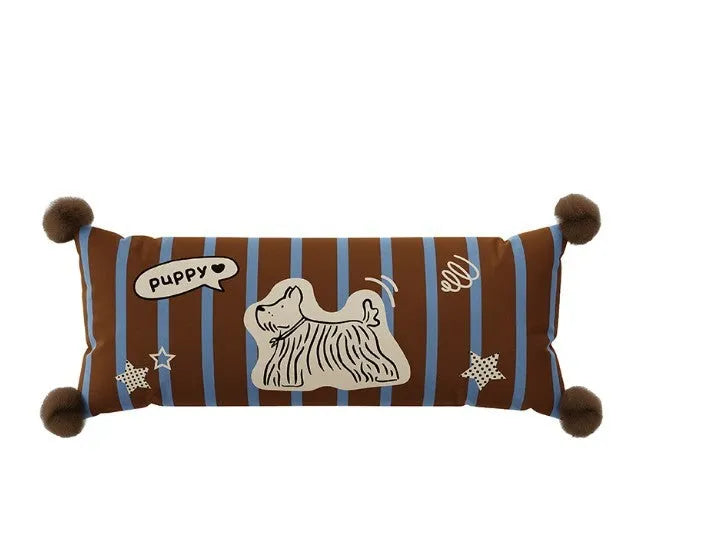 Blue cartoon animal print sofa cushion pillow on a grey sofa.