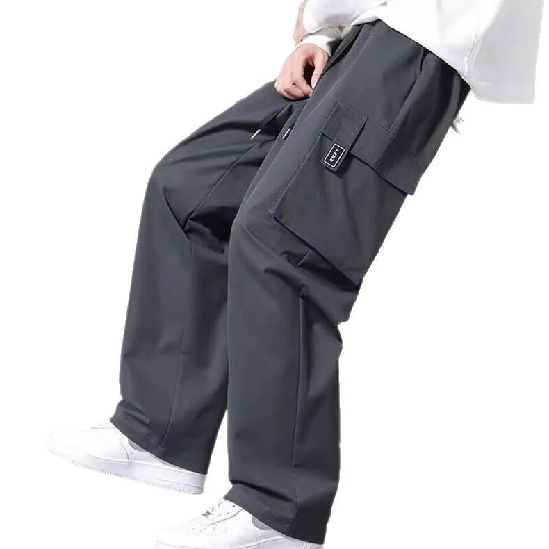 Boys straight leg cargo pants in Army Green with large pockets and a drawstring waist
