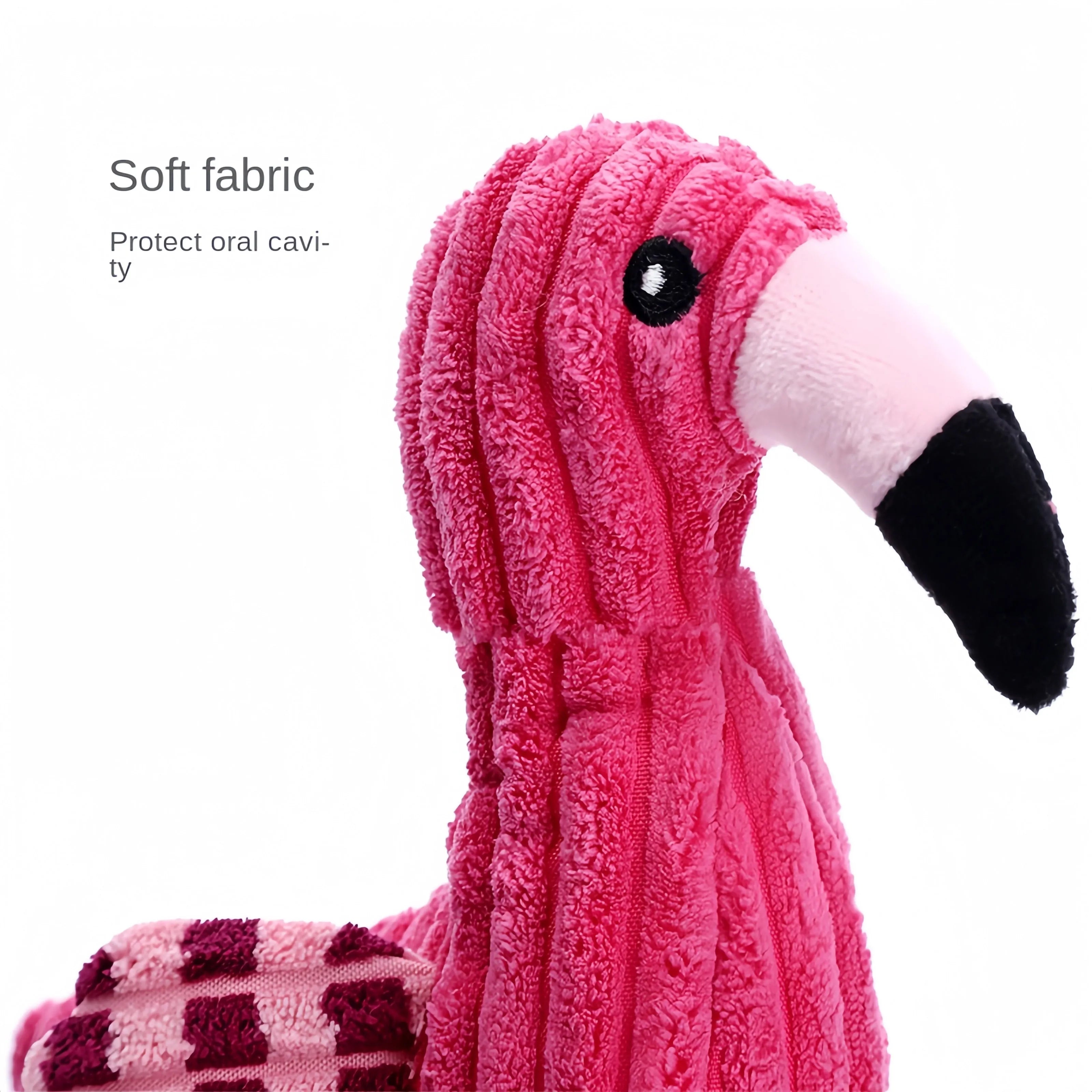 Pink corduroy hippo and parrot squeaky plush dog toys on a white background.