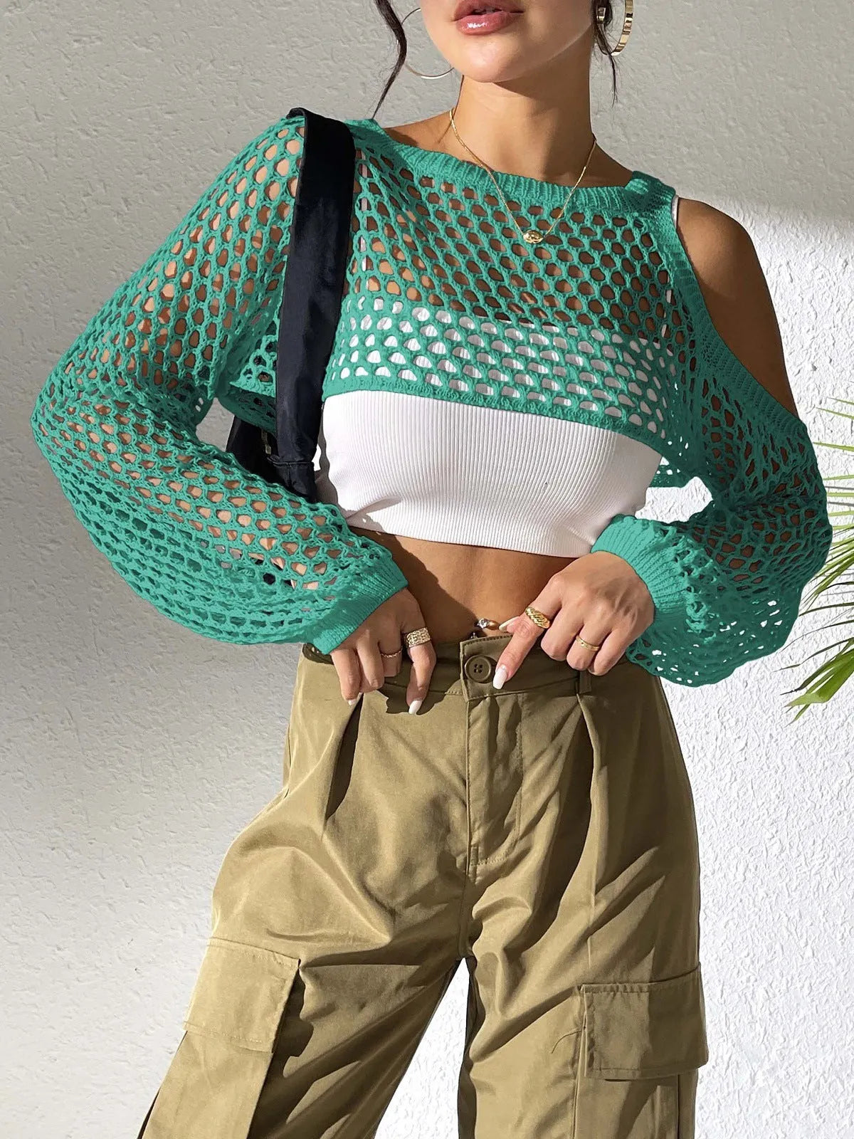 Mesh shirt with a navel cutout design in a free size, shown in one of six available colours.