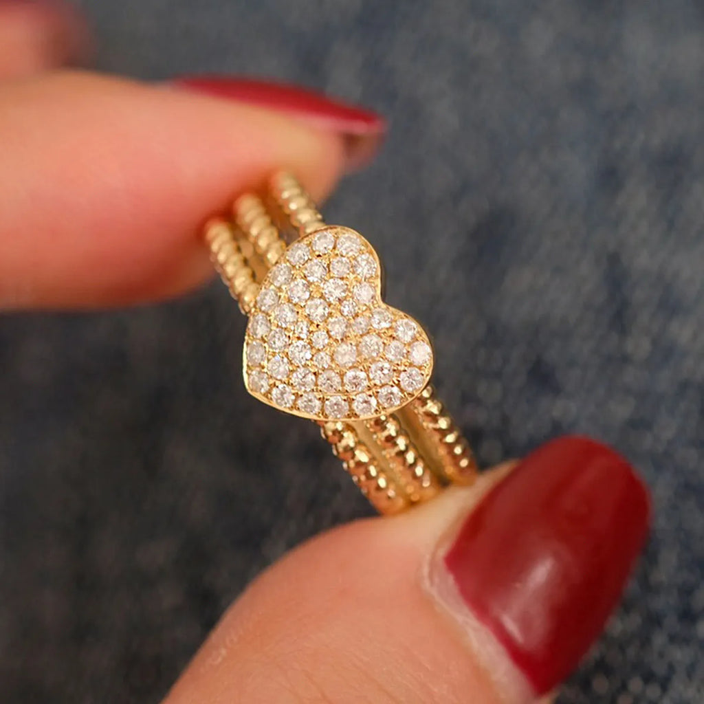 S925 sterling silver ring with heart twist design, available in white gold or yellow gold finish, US sizes 6 to 10
