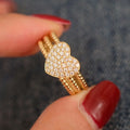 S925 sterling silver ring with heart twist design, available in white gold or yellow gold finish, US sizes 6 to 10