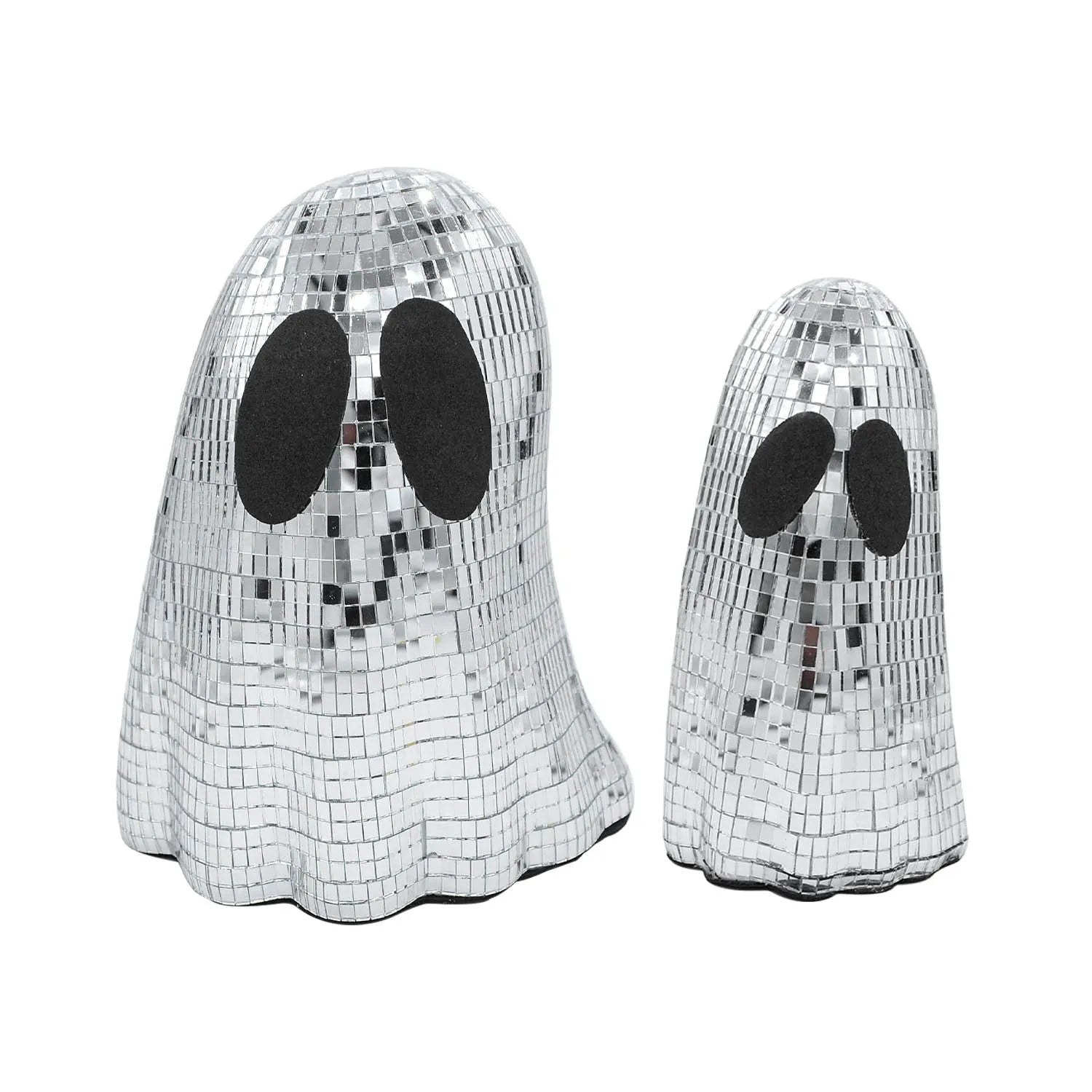 Silver Halloween ghost ornament with mosaic glass surface on wooden desk