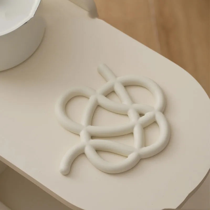 Ceramic heat proof mat with irregular shape in modern simplicity style