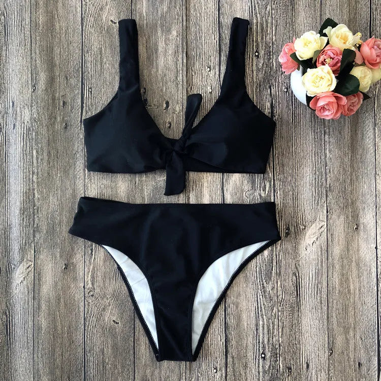 Ladies polyester bikini set in black colour with matching bra and panties