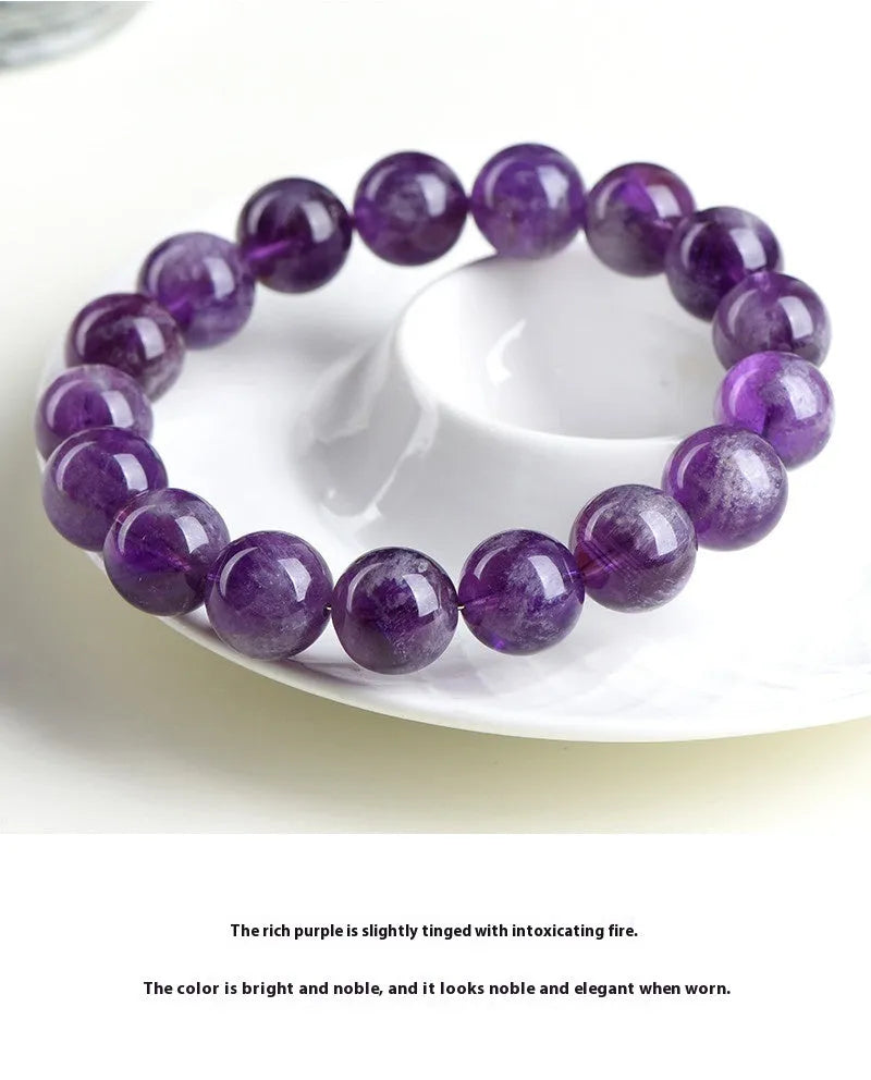 Natural feather amethyst snow mountain purple bracelet with geometric beads featuring the Ruyi symbol.