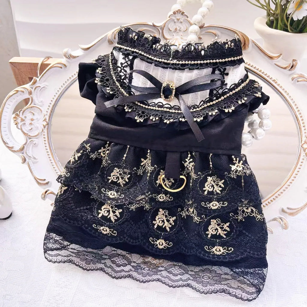 Golden gothic lolita-style skirt costume on a small dog, showing princess design.