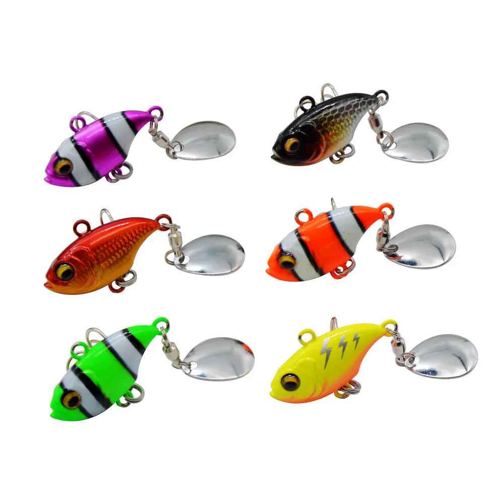 Metal sea fishing lure with rotating sequins shown in multiple colour options including zebra orange and gold.