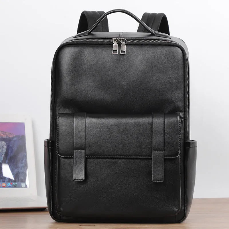 Black genuine leather men's business laptop backpack with 36-55L capacity showing weaving design details