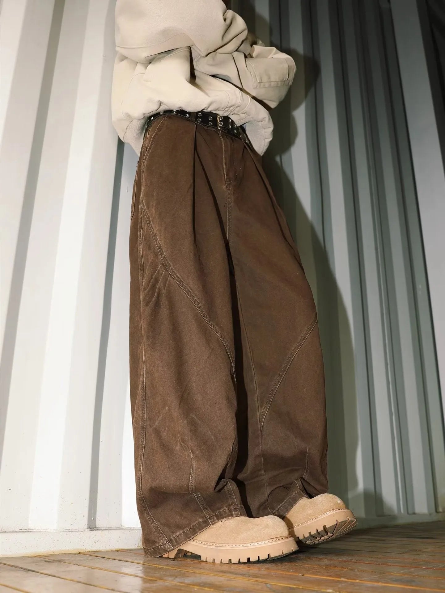 Men's pleated straight leg trousers in apricot colour with stripe pattern and loose fit design