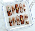 Handmade wearable French style nail art stickers with jelly glue and rubbing strip, in S, M, and L size codes.