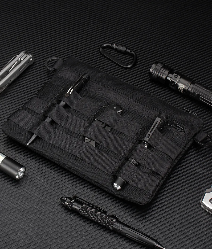Black solid colour oxford cloth portable outdoor organiser bag with 18cm by 3.5cm dimensions.