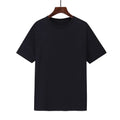 Men's loose fit black cotton t-shirt with short sleeves on a hanger.