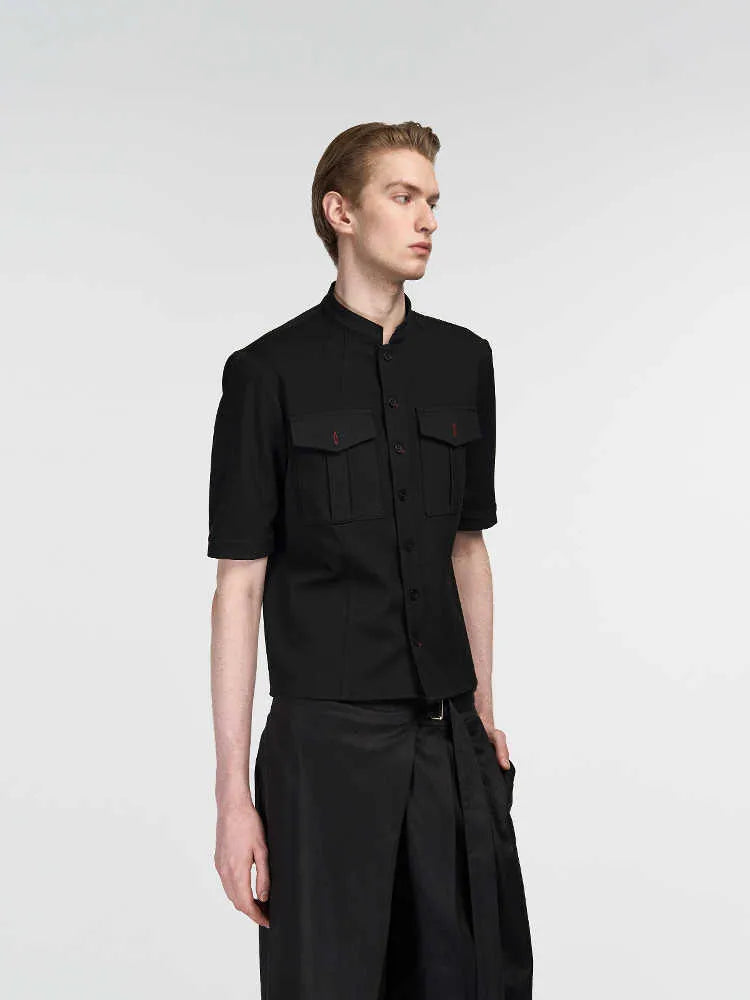 Handmade black half sleeve hunting shirt with shirt collar, shown as part of a Red Eye hunting suit.
