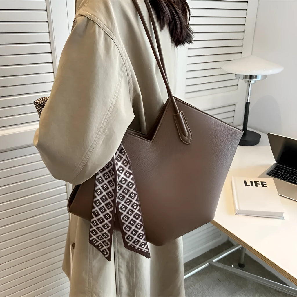 Women's black PU leather shoulder bag with 43cm width and sandwich pocket exterior design