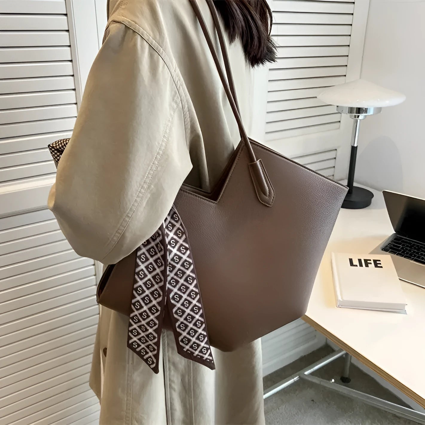 Women's black PU leather shoulder bag with 43cm width and sandwich pocket exterior design