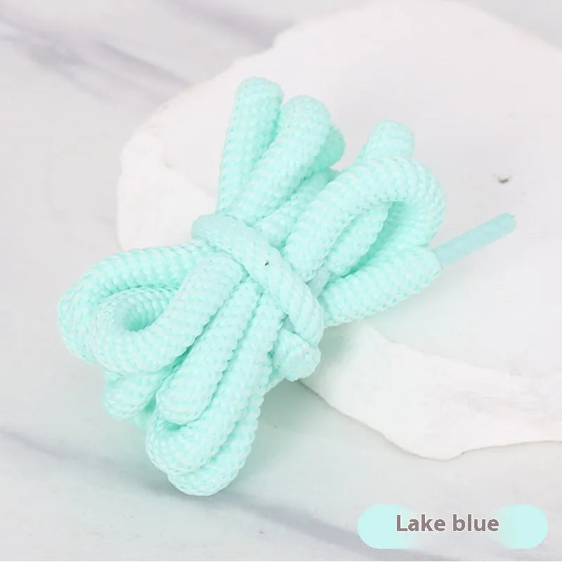 A selection of round braided shoelaces and hoodie cords in various colours, showing 1.0cm width