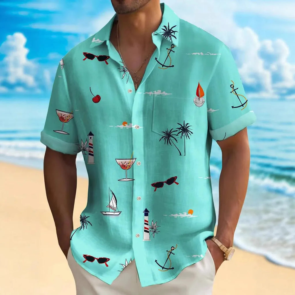 Man wearing a loose fit short sleeve shirt with a colourful digital Hawaiian print pattern.